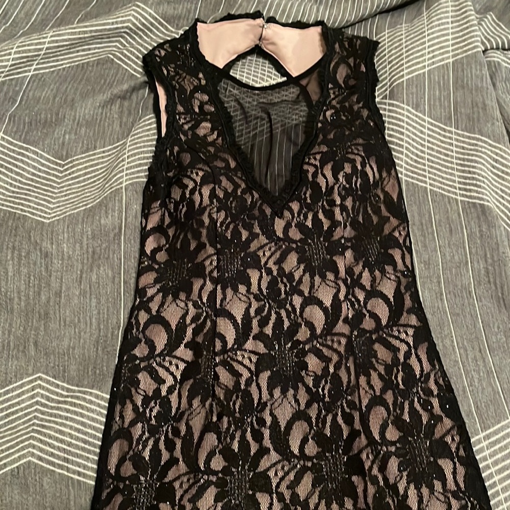 Black lace dress. Great condition worn once. Size 5 in women’s.